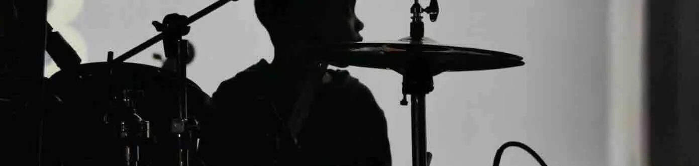 Real Brave expert music instructors teaching guitar, piano, drums, and voice